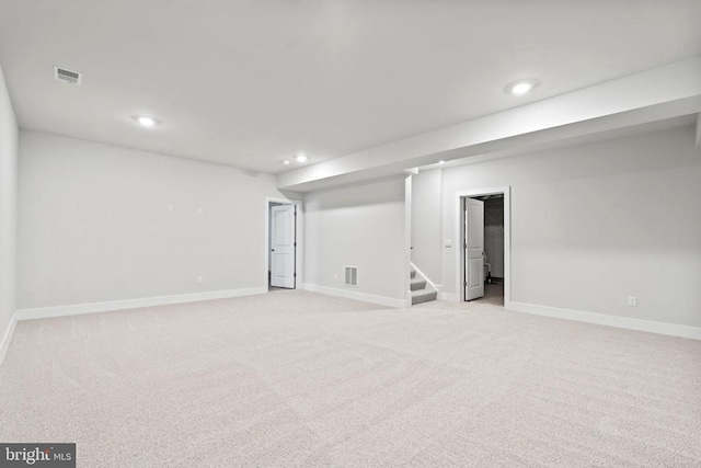 11796 Wales Dr, Fredericksburg, VA 22407 - finished below grade area featuring recessed lighting, stairs, and light carpet