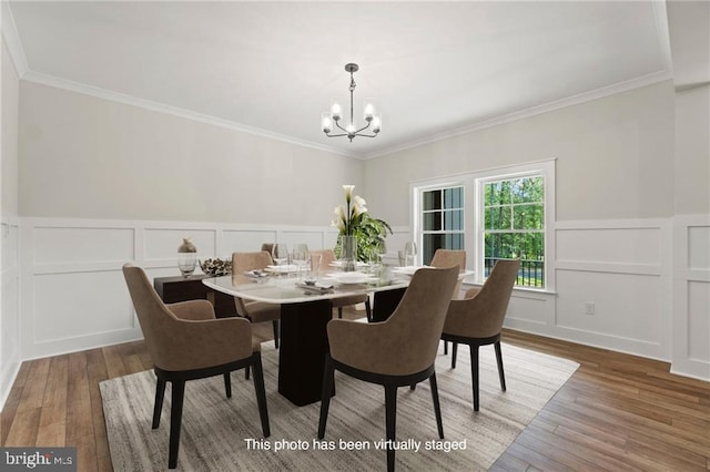 465 Glenmore Ln Lot 30, Keswick, VA 22947 - dining area featuring a decorative wall, a chandelier, hardwood / wood-style flooring, crown molding, and wainscoting