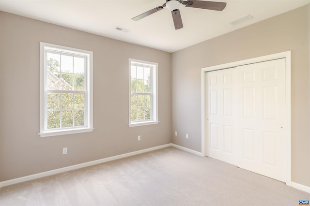 1875 Clay Dr, Crozet, VA 22932 - unfurnished bedroom with light colored carpet, a closet, and ceiling fan