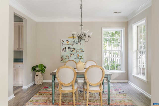 1875 Clay Dr, Crozet, VA 22932 - dining space with a chandelier, ornamental molding, and light wood finished floors
