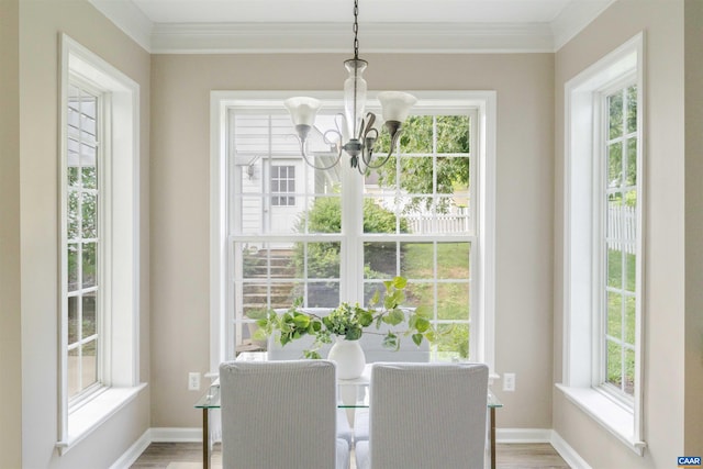 1875 Clay Dr, Crozet, VA 22932 - dining area featuring a chandelier, plenty of natural light, crown molding, and wood finished floors