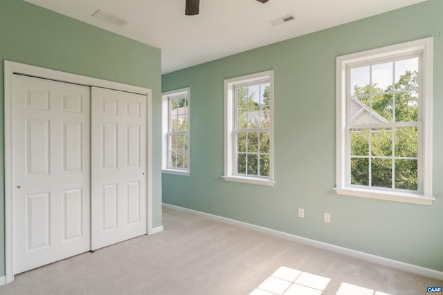 1875 Clay Dr, Crozet, VA 22932 - unfurnished bedroom with carpet, a closet, and ceiling fan