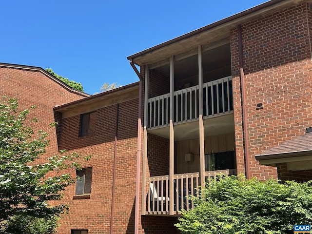 125 Turtle Creek Rd Unit 9, Charlottesville, VA 22901 - view of side of property with brick siding and a balcony