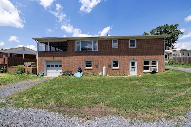 5226 Dogwood Dr, Mount Jackson, VA 22842 - back of property with driveway, a garage, brick siding, and cooling unit