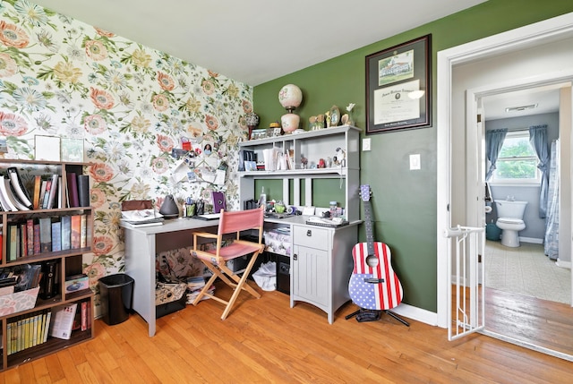 5226 Dogwood Dr, Mount Jackson, VA 22842 - office space featuring light wood-style floors, wallpapered walls, and an accent wall