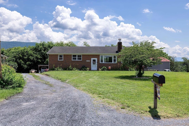 5226 Dogwood Dr, Mount Jackson, VA 22842 - ranch-style home featuring gravel driveway, a chimney, a front yard, and brick siding
