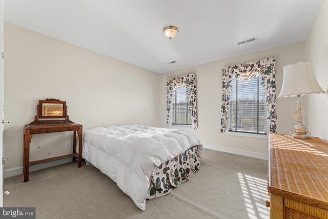 bedroom featuring carpet