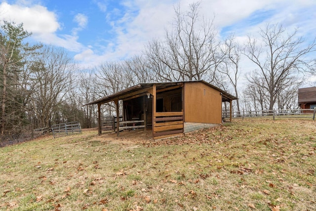 view of outbuilding featuring an outbuilding and an exterior structure