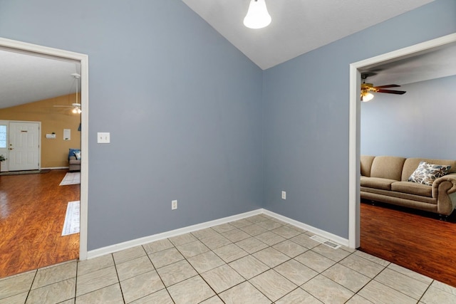 88 Ashleigh Dr, Waynesboro, VA 22980 - unfurnished room with lofted ceiling, a ceiling fan, light wood-style flooring, and baseboards