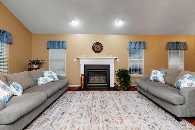 88 Ashleigh Dr, Waynesboro, VA 22980 - living area featuring wood finished floors, a fireplace with flush hearth, baseboards, and recessed lighting