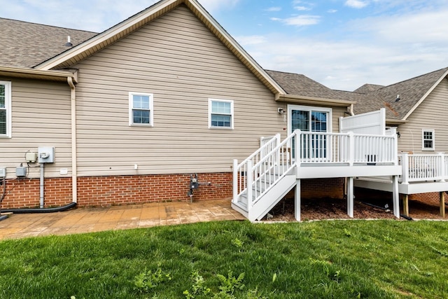 88 Ashleigh Dr, Waynesboro, VA 22980 - rear view of property with a wooden deck, a lawn, and roof with shingles