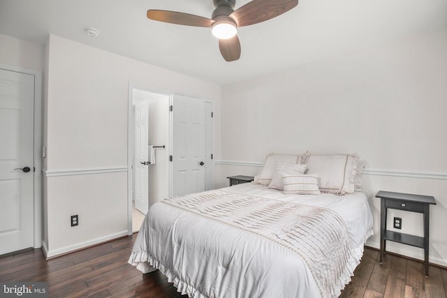  - bedroom with hardwood / wood-style flooring and a ceiling fan