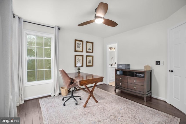  - office with a ceiling fan, wood-type flooring, and baseboards