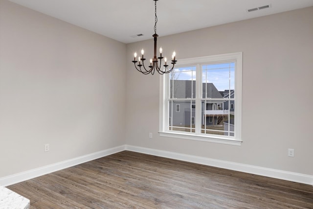 LOT154 Langley Dr, Waynesboro, VA 22980 - empty room with a chandelier, dark wood finished floors, and baseboards