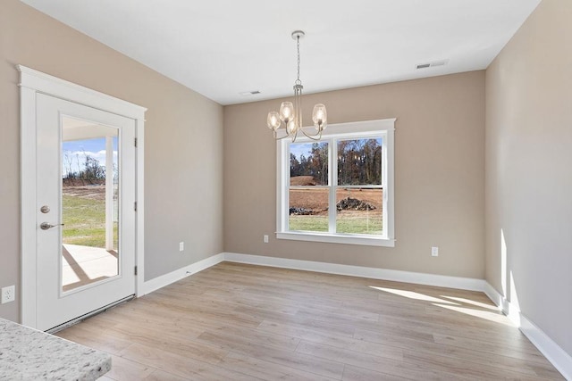 LOT154 Langley Dr, Waynesboro, VA 22980 - unfurnished dining area with a chandelier, light wood-style flooring, and baseboards