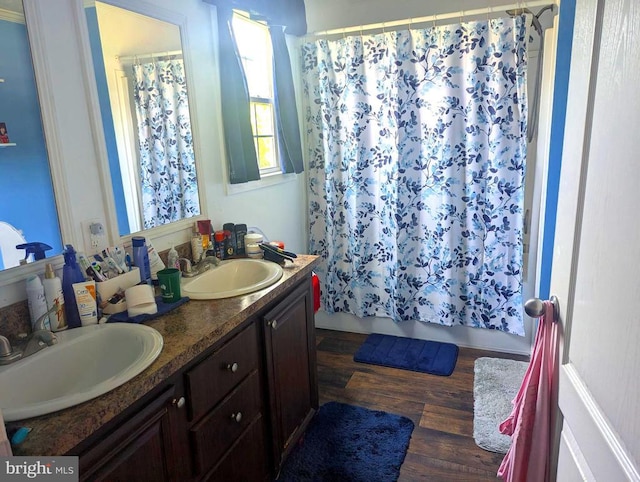 10834 Tidewater Trl, Fredericksburg, VA 22408 - full bath with double vanity, wood finished floors, and shower / tub combo