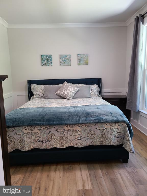 150 Winchester Trl, Mineral, VA 23117 - bedroom featuring wood finished floors and crown molding