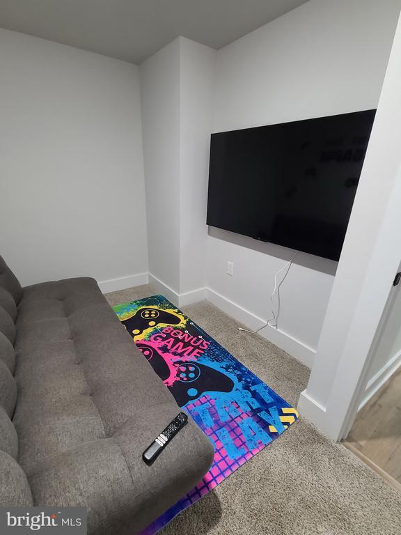 150 Winchester Trl, Mineral, VA 23117 - carpeted living area featuring baseboards