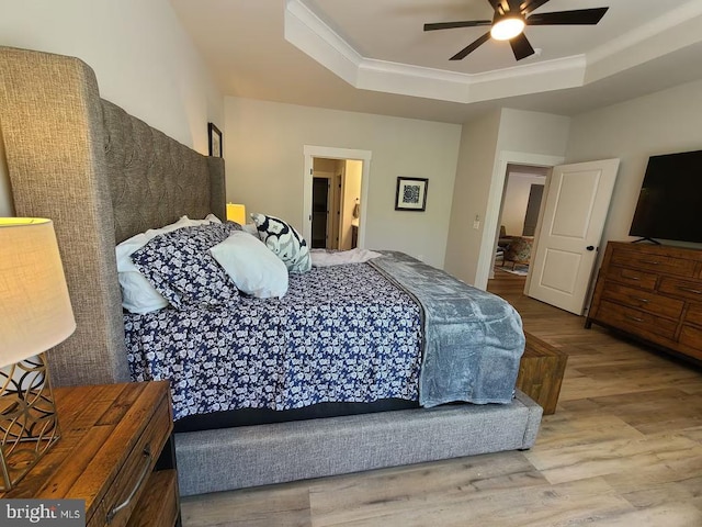 150 Winchester Trl, Mineral, VA 23117 - bedroom featuring a tray ceiling, wood finished floors, ornamental molding, and a ceiling fan