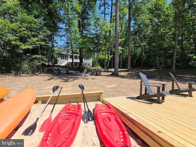 150 Winchester Trl, Mineral, VA 23117 - view of yard featuring a deck and view of wooded area