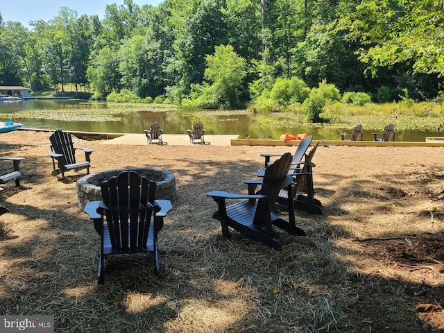 150 Winchester Trl, Mineral, VA 23117 - view of yard with an outdoor fire pit, a water view, and a view of trees