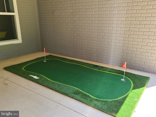 150 Winchester Trl, Mineral, VA 23117 - rec room featuring a putting area and brick wall