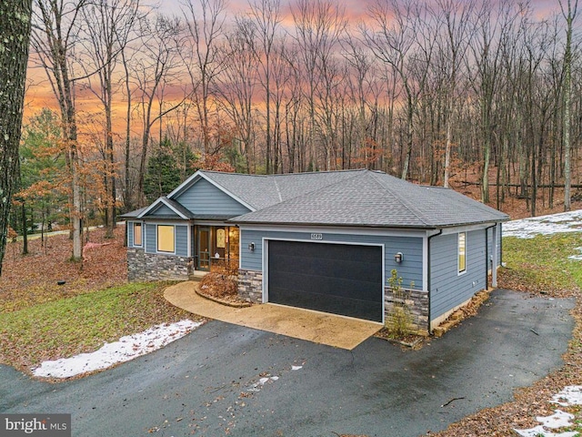 view of front of property featuring a garage