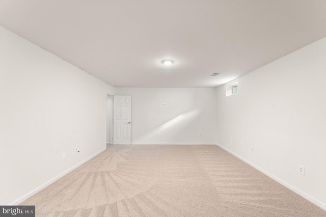  - basement featuring carpet flooring and baseboards