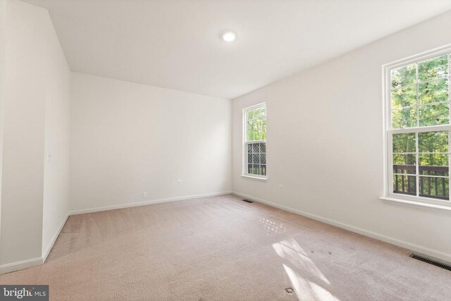  - carpeted spare room with baseboards and recessed lighting