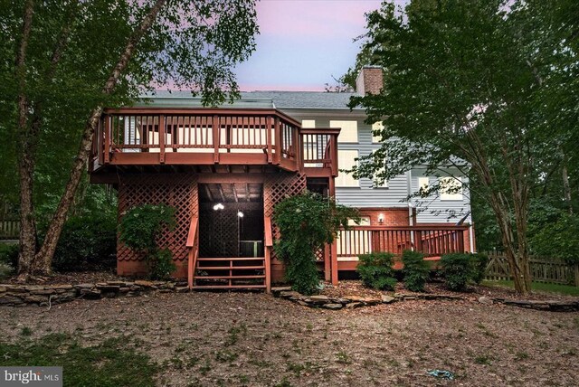 7924 Gold Leaf Cir, Spotsylvania, VA 22551 - back of property with a wooden deck and a chimney