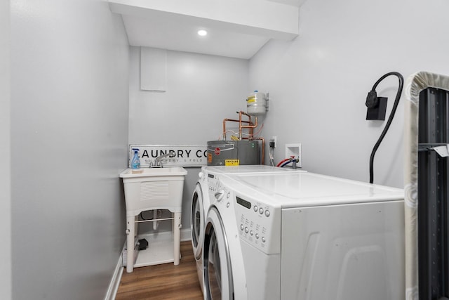2003 Rinacas Corner Rd, Shenandoah, VA 22849 - laundry area featuring washer and clothes dryer, dark wood-style floors, water heater, baseboards, and recessed lighting