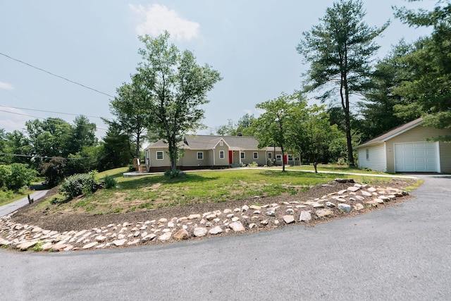 2003 Rinacas Corner Rd, Shenandoah, VA 22849 - ranch-style house featuring a garage, a front yard, and an outbuilding