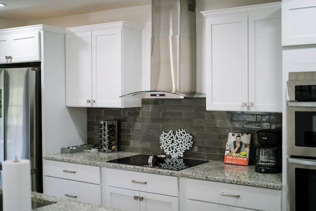 2003 Rinacas Corner Rd, Shenandoah, VA 22849 - kitchen featuring wall chimney exhaust hood, appliances with stainless steel finishes, decorative backsplash, and white cabinets