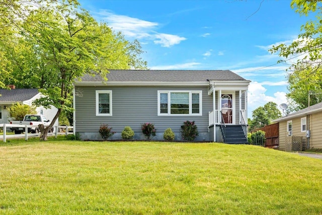 view of front of home featuring a front lawn