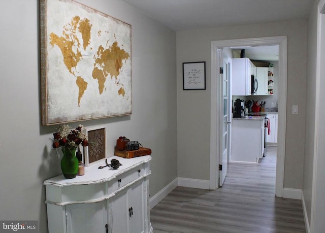 12134 Baylor Ln, Orange, VA 22960 - hall with light wood-style floors and baseboards