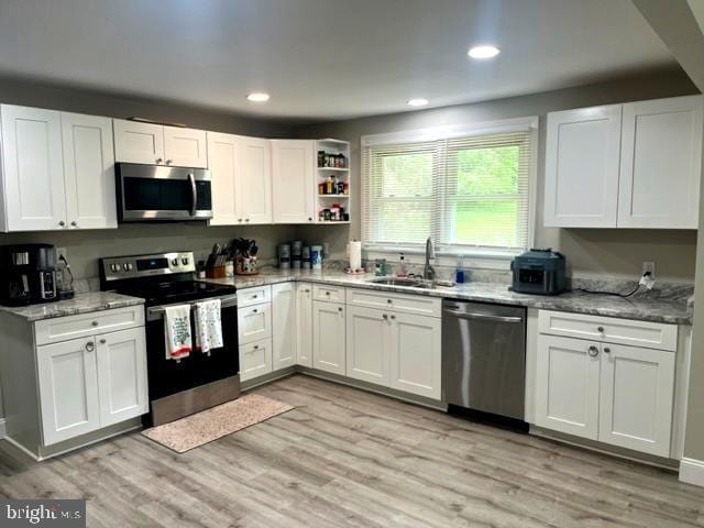 12134 Baylor Ln, Orange, VA 22960 - kitchen featuring stainless steel appliances, white cabinetry, and recessed lighting