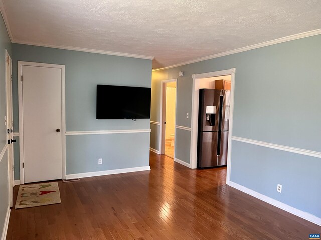 4646 Woods Edge Rd, Troy, VA 22974 - spare room with wood finished floors, a textured ceiling, baseboards, and ornamental molding