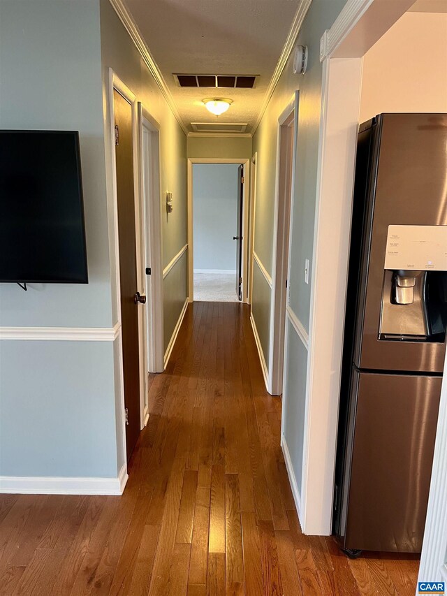 4646 Woods Edge Rd, Troy, VA 22974 - hallway with ornamental molding, hardwood / wood-style flooring, and baseboards