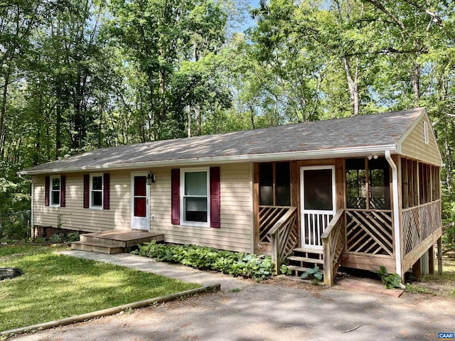 4646 Woods Edge Rd, Troy, VA 22974 - ranch-style home featuring a sunroom and roof with shingles