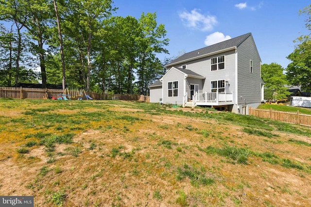 12929 Pipe Run Dr, Fredericksburg, VA 22407 - back of house with a wooden deck and a fenced backyard