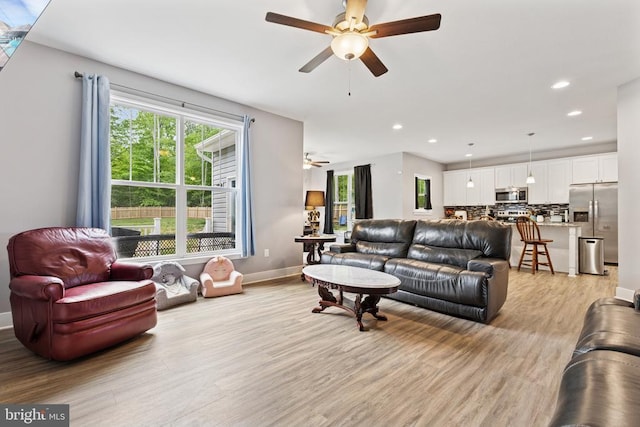 12929 Pipe Run Dr, Fredericksburg, VA 22407 - living room with a ceiling fan, light wood finished floors, baseboards, and recessed lighting