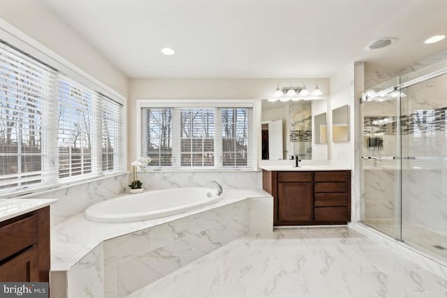 full bathroom with a marble finish shower, vanity, a bath, marble finish floors, and recessed lighting