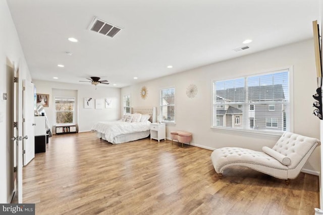 bedroom featuring light wood-style flooring, recessed lighting, baseboards, and a ceiling fan