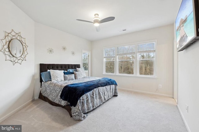 bedroom featuring carpet flooring, baseboards, and a ceiling fan