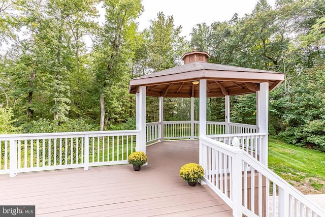 wooden deck featuring a gazebo