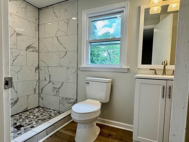 356 Florence Ave, Waynesboro, VA 22980 - full bath with toilet, wood finished floors, baseboards, vanity, and a tile shower