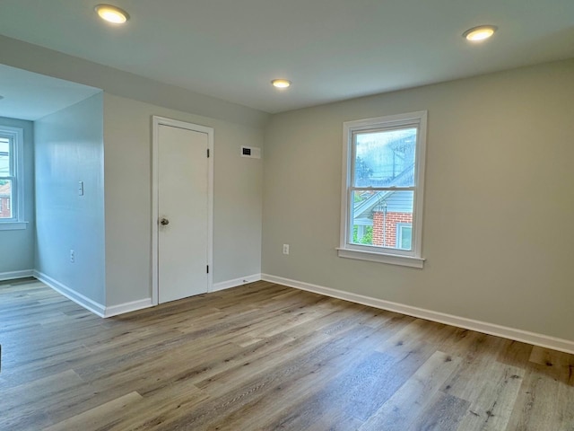 356 Florence Ave, Waynesboro, VA 22980 - empty room with plenty of natural light, wood finished floors, baseboards, and recessed lighting