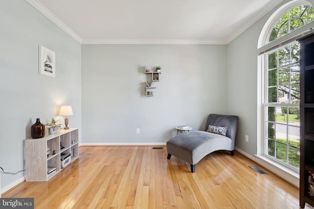 12314 Osprey Ln, Culpeper, VA 22701 - sitting room featuring plenty of natural light, ornamental molding, and wood finished floors