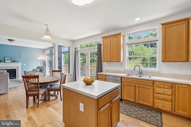 12314 Osprey Ln, Culpeper, VA 22701 - kitchen with light wood-type flooring, plenty of natural light, open floor plan, a high end fireplace, and recessed lighting
