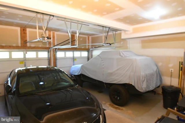 garage featuring a garage door opener